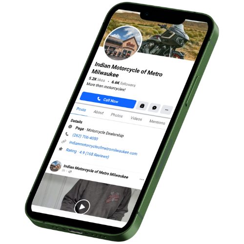 Phone Displaying Facebook Newsfeed